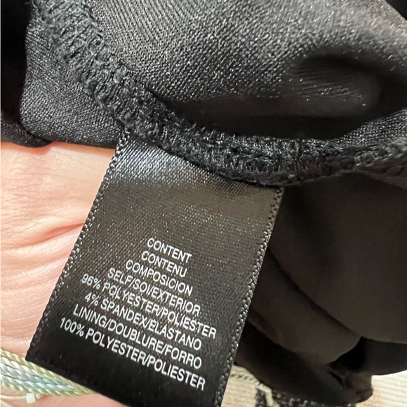 Tight fitting black bodysuit with shape outline detail throughout - Picture 12 of 12